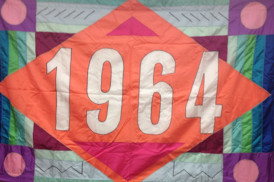 colorful flag with class year 1964