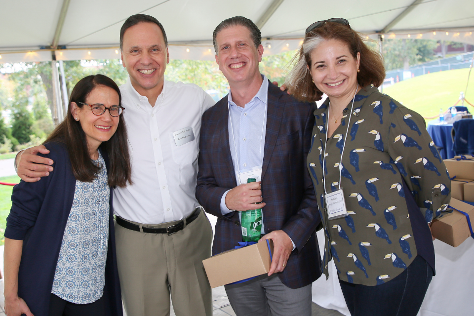 Brandeis President Ron Liebowitz standing with his wife and two parents