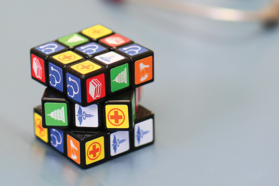 Rubik's cube with health field-related logos