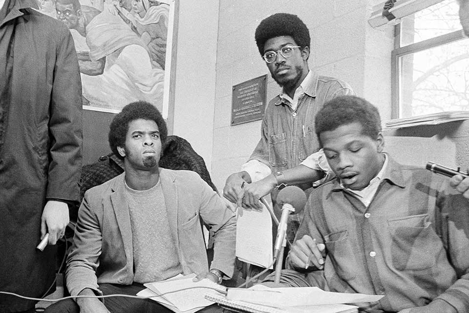 Student activists speak to the press during Ford Hall occupation in 1969. 
