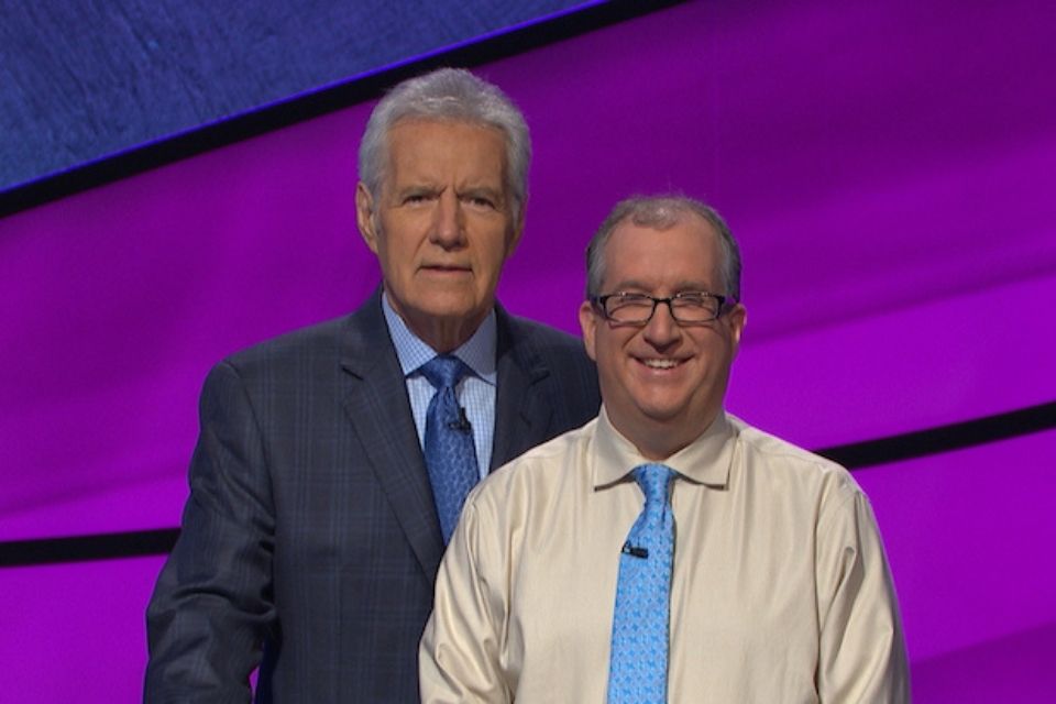 Adam Levin and Jeopardy host Alex Trebek