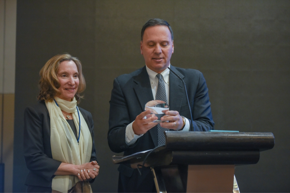 Right, President Liebowitz presents the Asper Award to Roberta Lipson, left