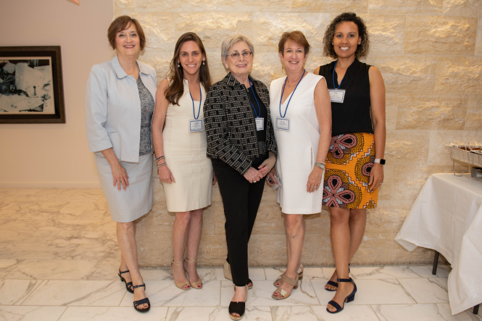 Standing, from left to right: Patsy Fisher, Talee Potter, Dona Kahn, Amy Cohen, and Nikki Mannathoko at the launch of the Women's Network in New York City