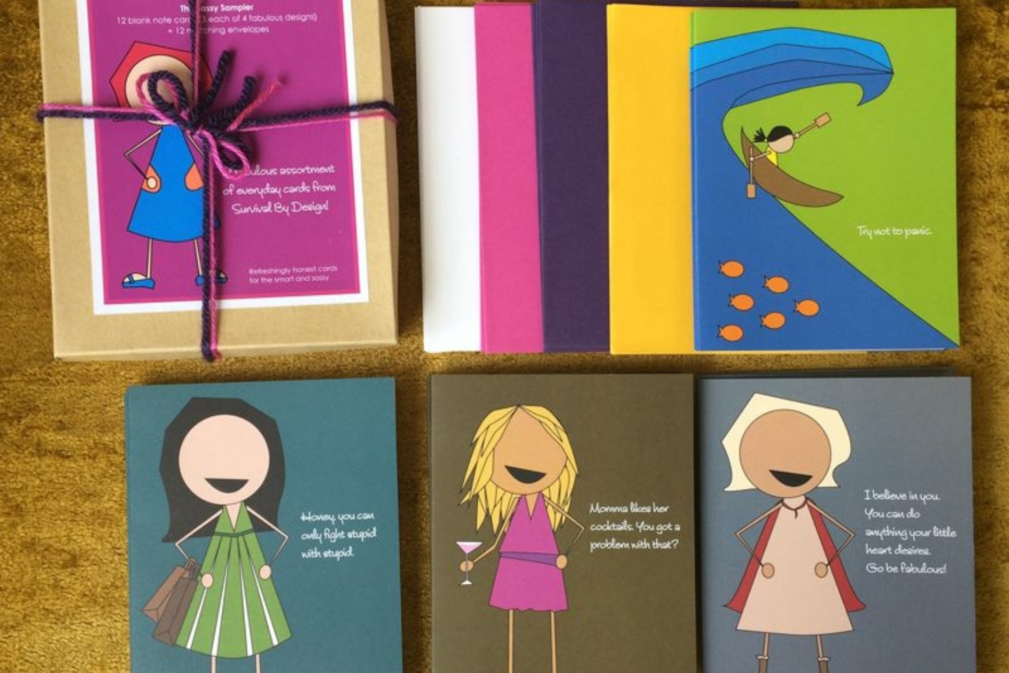 Multiple colorful greeting cards with cartoon people on them