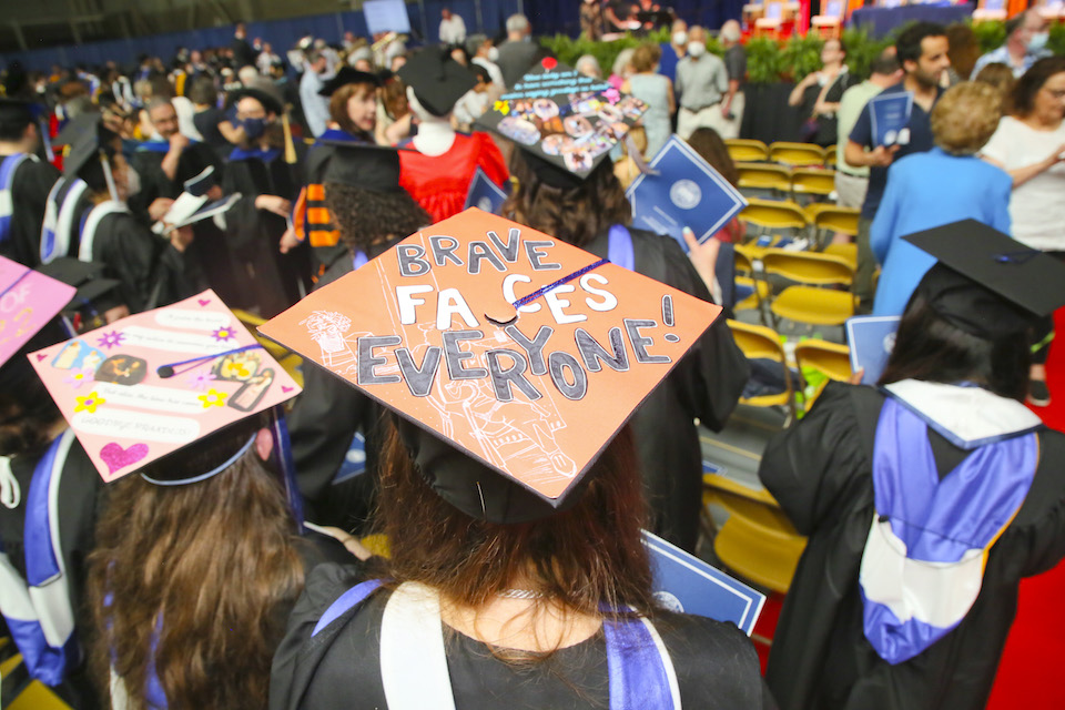 A mortarboard that says brave faces everyone!