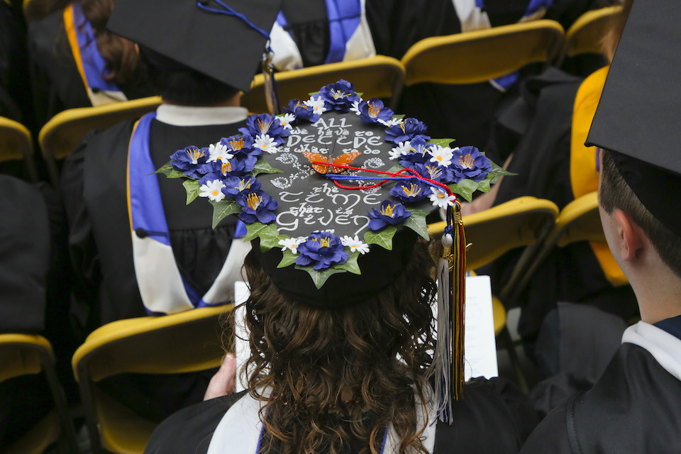 mortarboard decorated with flowers and vines