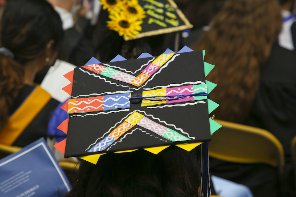 A colorful abstract decoration on a mortarboard