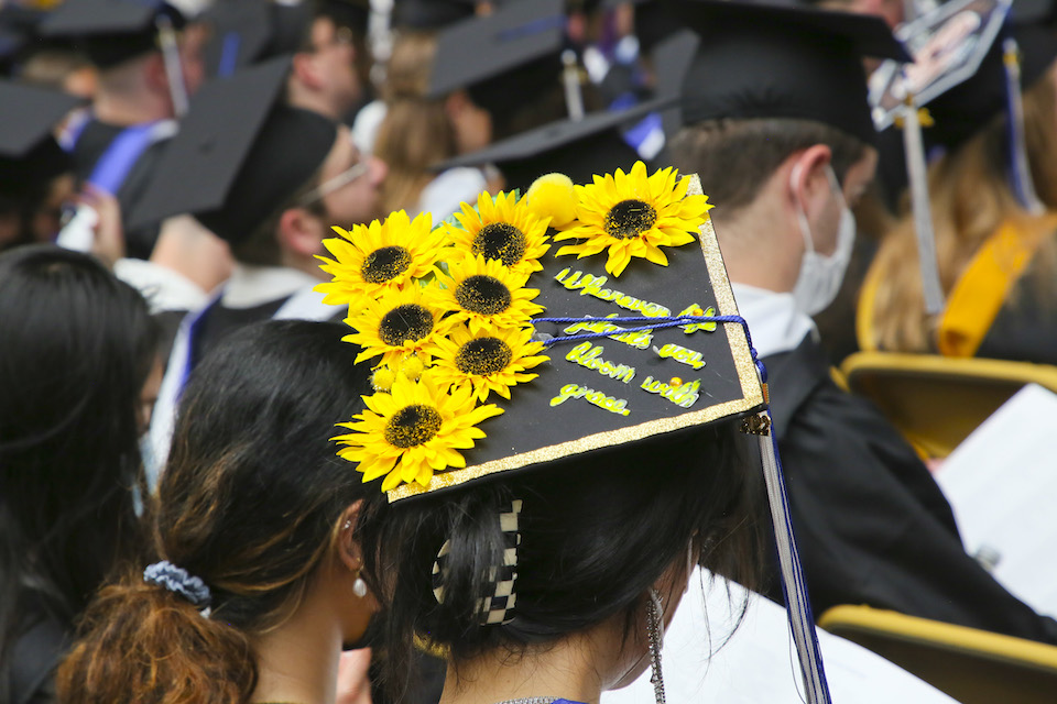 Mortarboard decorated with yellow flowers