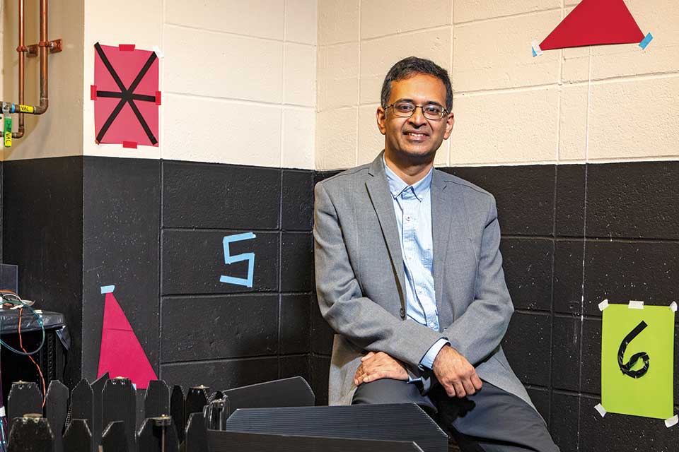 Shantana Jadhav sitting in a lab.