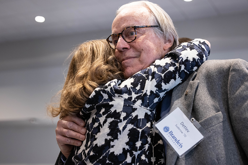 1970 Brandeis graduate Detlev Suderow  hugs his wife Ellen Beth Lande, who graduated Brandeis in 1973, after receiving the Lighting the Way award in Sherman Function Hall on March 31. Suderow and Lande met each other while they attended Brandeis.