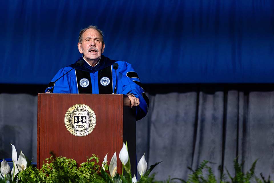 Interim President Arthur Levine delivers remarks at the podium