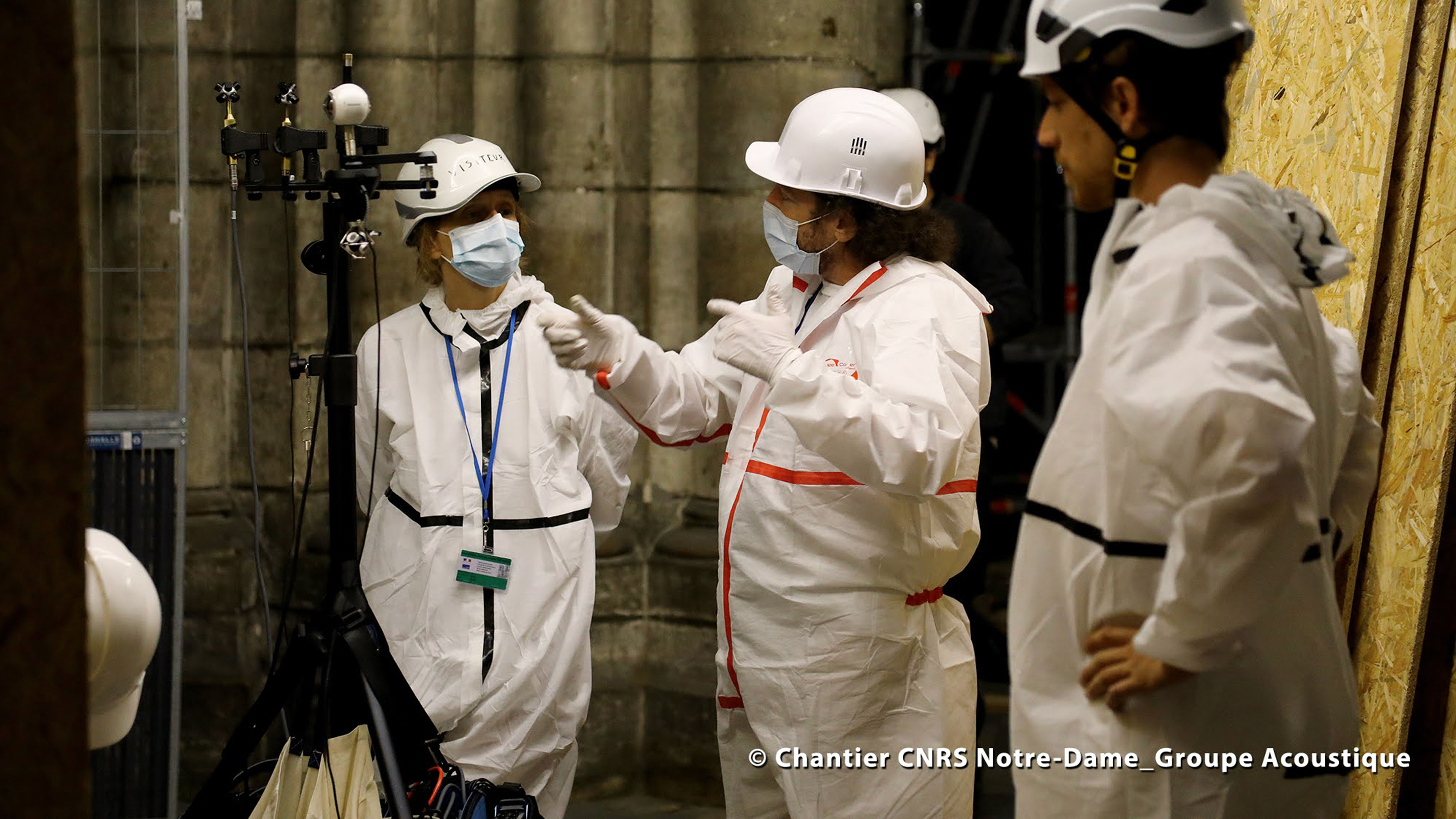 Katz in hazmat suit doing testing during the restoration