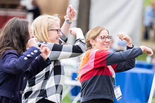 Alumni dancing together