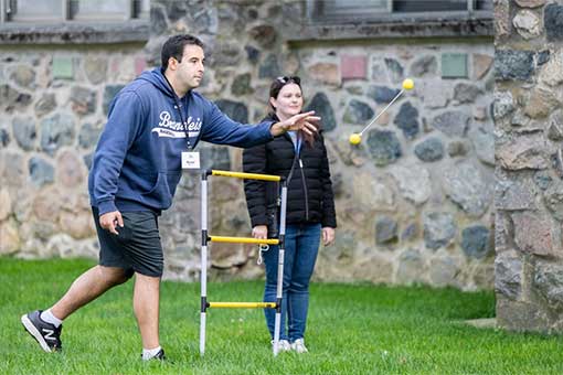Alumni playing lawn games