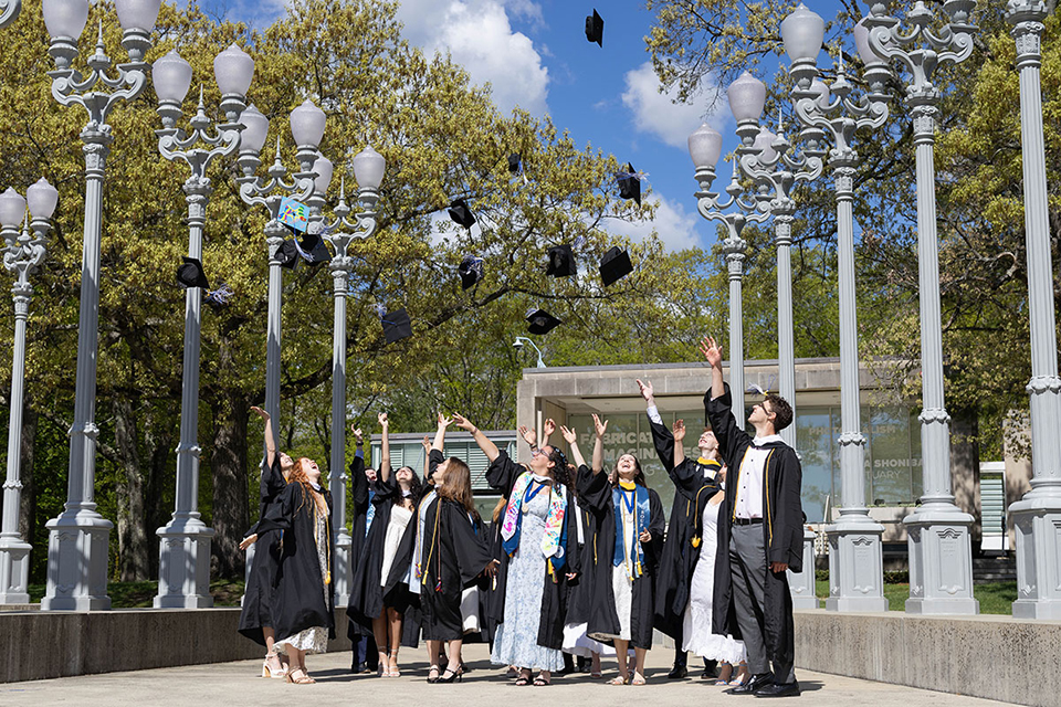 Several students in caps and gowns