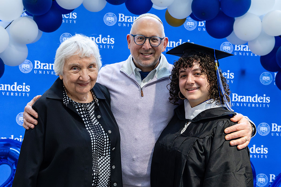 Joy Fish '56,  Ron Fish '91, and Nili Fish-Bieler '26 pose together for a photo taken at Nili's commencement celebration.