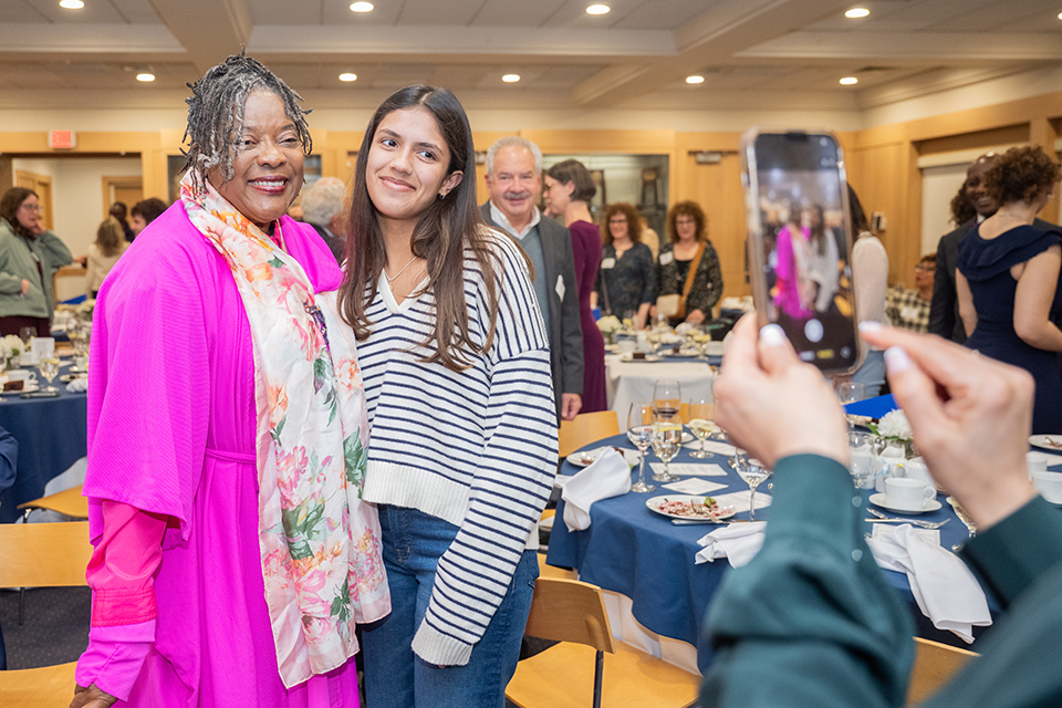 Loretta Devine and a Brandeis student taking iPhone photo