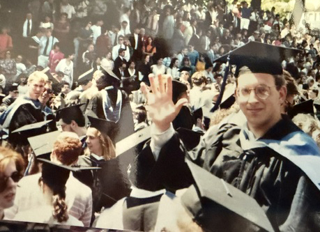 Ron Fish in a crowd of classmates at his commencement