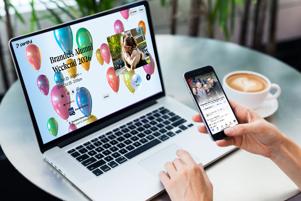 A phone has a Facebook event for Alumni Weekend open while a laptop does the same