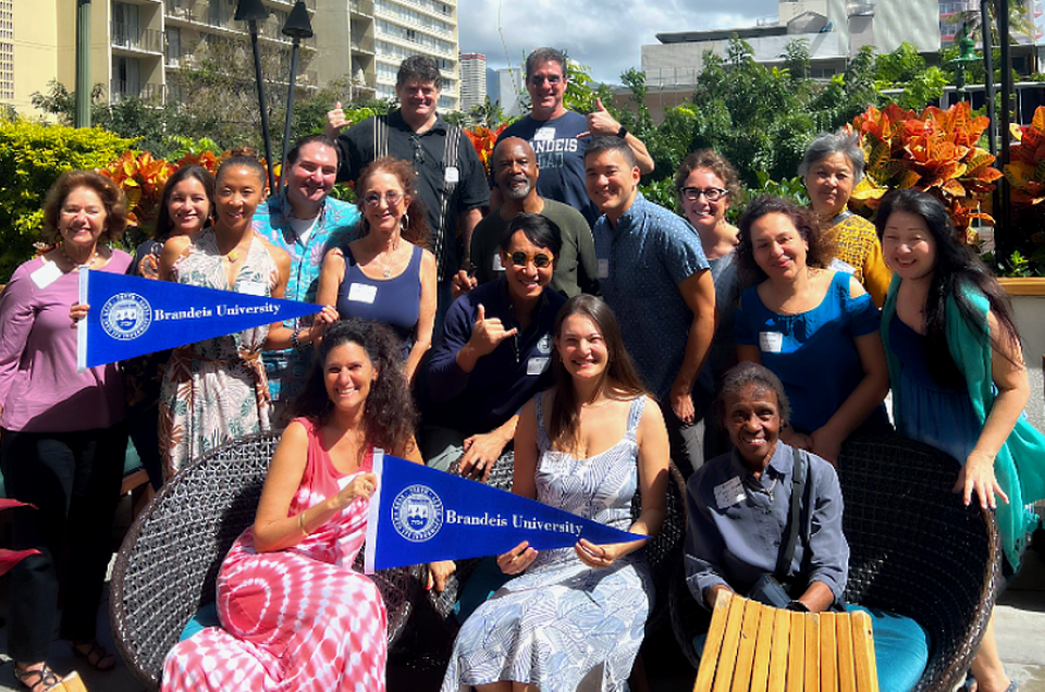 A Group of Alumni posing for a photo after a brunch in Hawaii