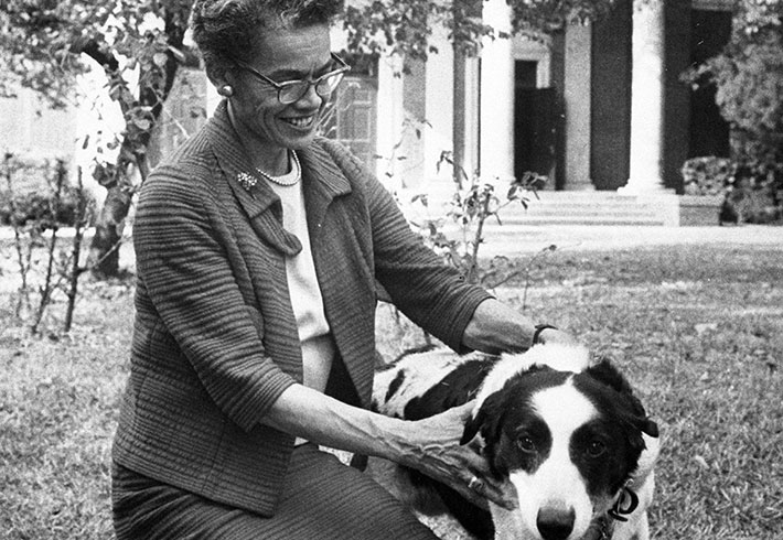 Pauli Murray on the Brandeis campus with a dog